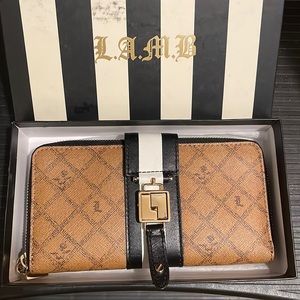 L.A.M.B. Zip around wallet in Saddle